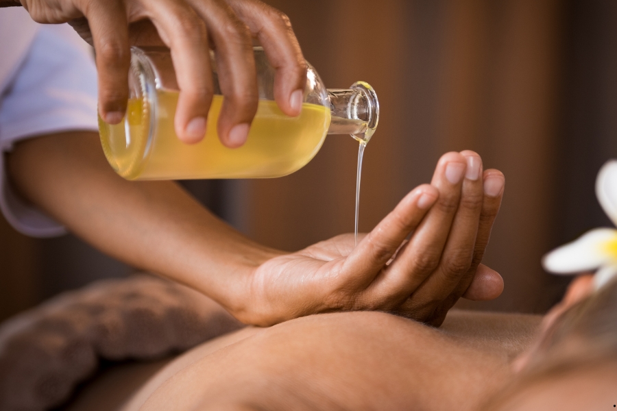 Luxury massage ambiance with warm oils